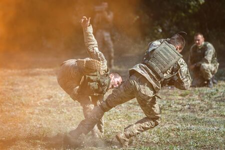 SAMBEK, ROSTOV REGION, RUSSIA, AUGUST 19, 2018: Historical festival Sambek Heights. Soldiers demonstrate hand-to-hand combatのeditorial素材