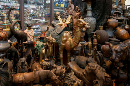 Dubai, UAE, January 13, 2019: Wooden and copper figurines as gifts for decoration in the house.
