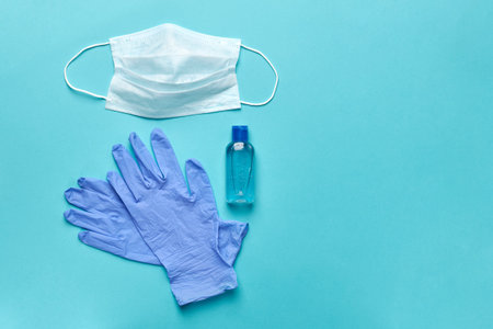 Necessary set for each person during the coronovirus pandemic consisting of a mask, gloves and a...