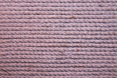 Rope laid in rows as background or backdropの写真素材