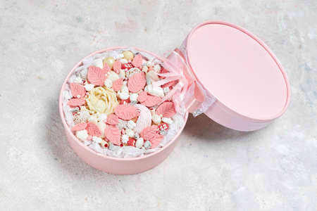 Pink box with white and pink chocolate sweets of handmadeの写真素材