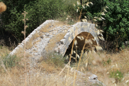 Simou village, Paphos district, Cyprus, August 8th, 2015: View of the Skarfos medieval bridgeのeditorial素材