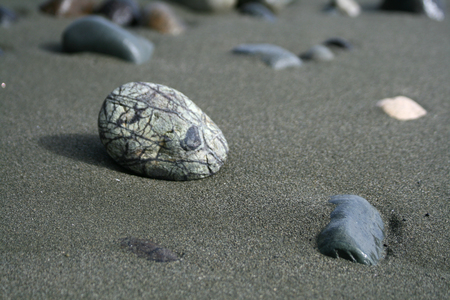 Stone on a sandの写真素材