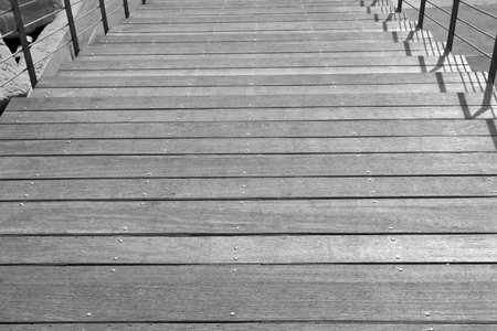 Texture of wide wooden outdoor staircase, black and whiteの写真素材