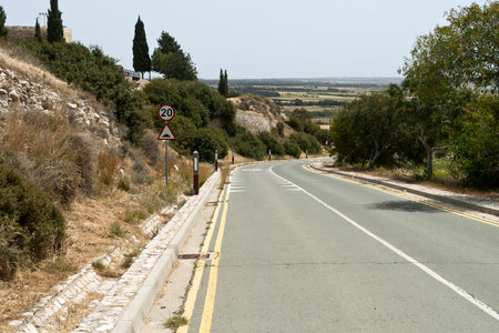 Empty asphalt country road in sunlight, Cyprusの写真素材