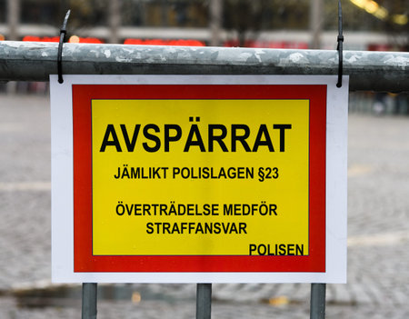 Swedish sign reading: cordoned off, egalitarian Police Act Â§ 23, violation entails criminal liability, policeの写真素材