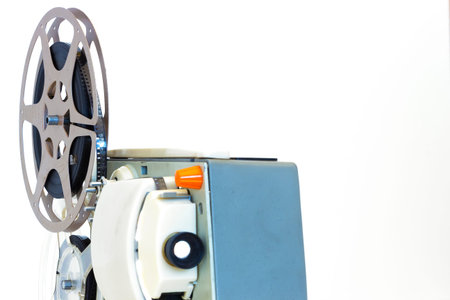 Home Cinema ; Old 8 mm home movie projector,isolated on white background,photography