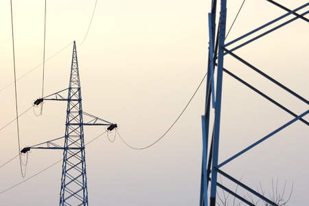 High Voltage Electric Line ; Power lines at sunset.の写真素材