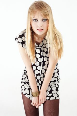 A young fashion girl in a dotted dress の写真素材