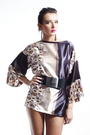 woman in satin tunic dress - pink lips make upの写真素材