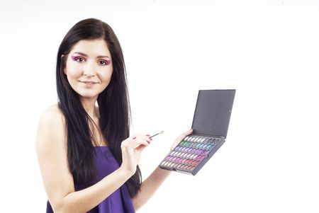 a nice woman holding an eyeshadow setの写真素材