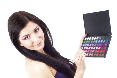 a nice woman holding an eyeshadow setの写真素材