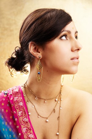 Beautiful indian brunette woman portrait with traditional costume の写真素材