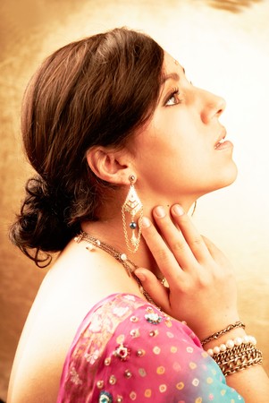 Beautiful indian brunette woman portrait with traditional costume の写真素材