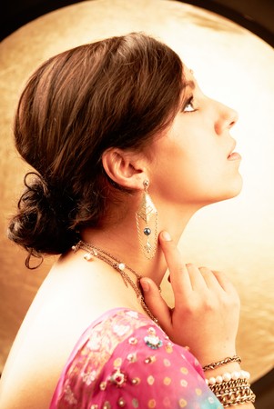 Beautiful indian brunette woman portrait with traditional costume の写真素材