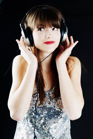 cheerful woman with headphonesの写真素材