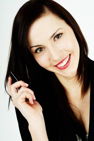 happy woman talking on the mobile phoneの写真素材