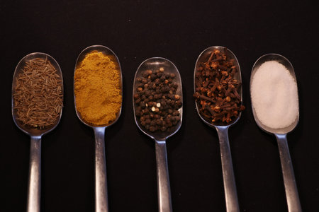 citchen herbs on a spoon