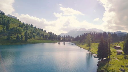 Drone flight during a sunset in the mountainsの写真素材