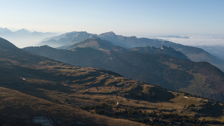 View of many mountain ranges lying one behind the otherの写真素材