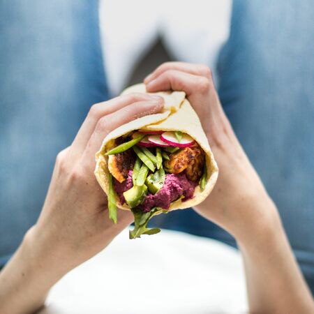 Beetroot Hummus Wrap with Halloumiの写真素材