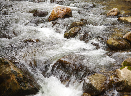 the power of water crosing between the rocks