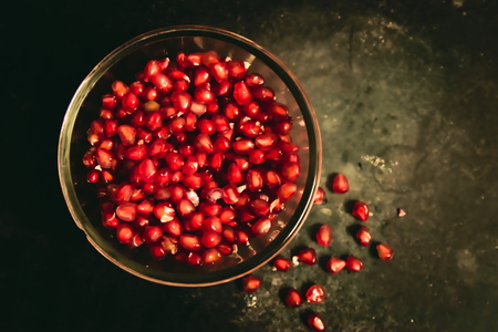 Fresh , peeled and juicy pomegranate seeds.の写真素材