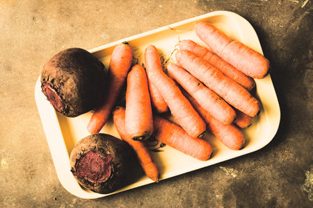 Freshly picked organic carrots and beets from a nearby market.