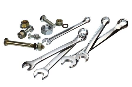 Various type of spanners with bolts and nuts isolated on white の写真素材