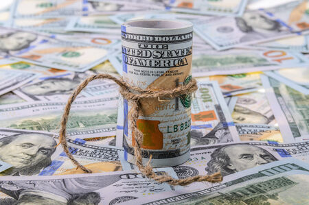 money concept  roll of dollarsの写真素材