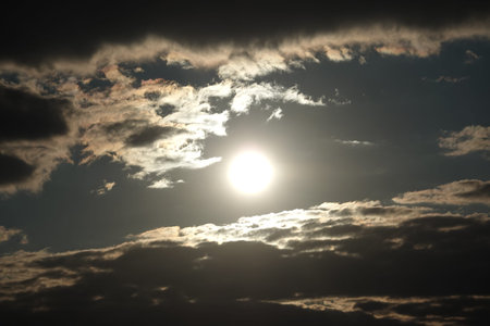 Sun with dramatic cloudy sky