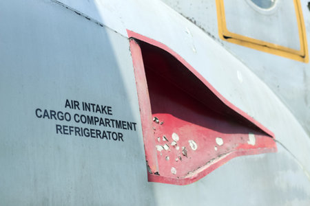 Air intake cargo compartment refrigerator decal on an old aircraftのeditorial素材
