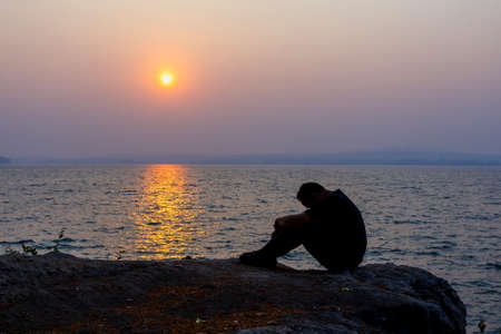 Beautiful sunrise,Silhouette peple with in sunrise, Thailand.の写真素材