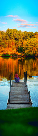 Girl on Dock - Veritcal Panoramicの写真素材