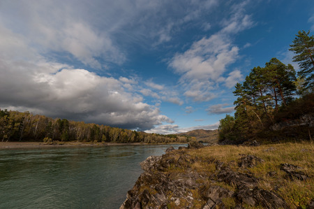 turquoise mountain Katun river with rocky shoresのeditorial素材
