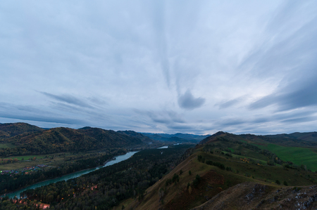 a magnificent panorama of the mountainous terrain and turquoise of the riverのeditorial素材