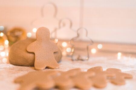 gingerbread on the table, made of honey and ginger dough. with an iron mold . the process of making gingerbread festive.の写真素材