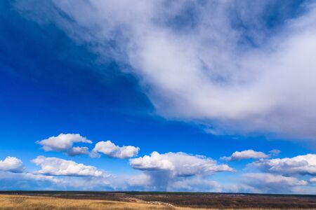 blue sky with white clouds on a clear Sunny day. photo for the banner. space for text.の写真素材
