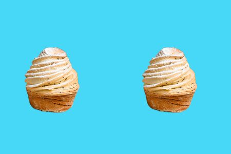 Seamless pattern of baking Cruffins on a blue background. muffins puff croissants trend 2020 . Wallpaper background pattern.の写真素材