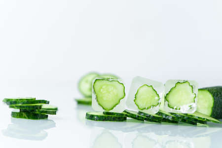 cosmetic ice cubes with cucumber for home face and body care, self-care, Spa treatments, skin detox, natural organic cosmetics at homeの写真素材