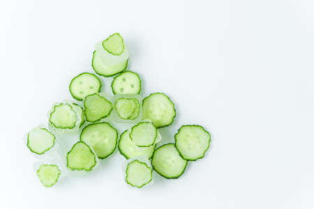 cosmetic ice cubes with cucumber for home face and body care, self-care, Spa treatments, skin detox, natural organic cosmetics at homeの写真素材