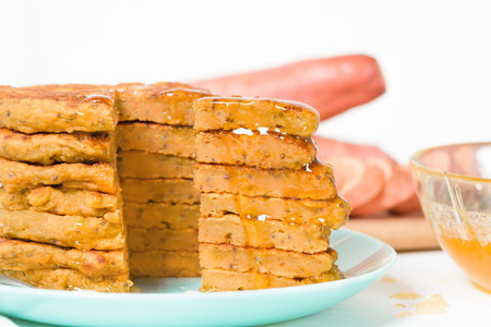homemade autumn stack vegetarian pancakes with sweet potatoes and Chia seeds, low-calorie Breakfast,...