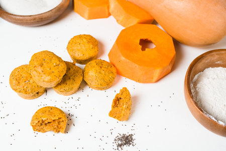 pumpkin cupcakes in a baking dish with chia seeds, autumn orange pie with orange.の写真素材