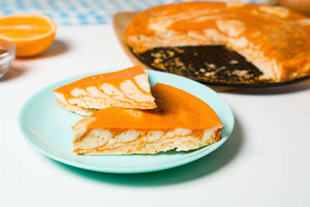 pumpkin casseroles with zebra-shaped cottage cheese, autumn orange pie. cut the pie into pieces on a plate .の写真素材