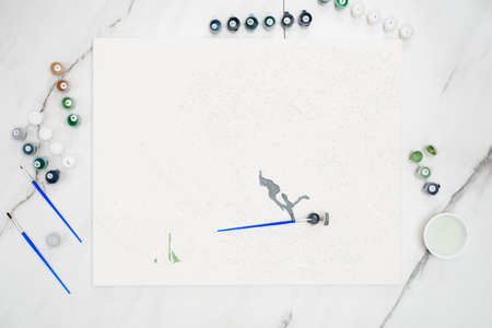 hobby at home painting by numbers to draw top view paint brush, painting.のeditorial素材