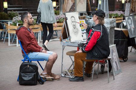 Arbat, Moscow Russia July 01 2017 Street painterのeditorial素材