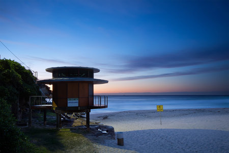 lifeguard hut on australian beach at dawnの写真素材