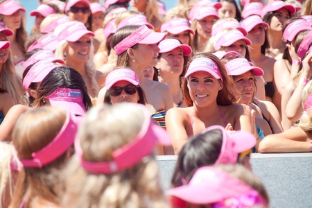 GOLD COAST, AUSTRALIA - OCTOBER 2, 2011: Unidentified participant march in successful Guinness World Record longest bikini parade on October 2,2011 in Gold Coast, Queensland, Australiaのeditorial素材
