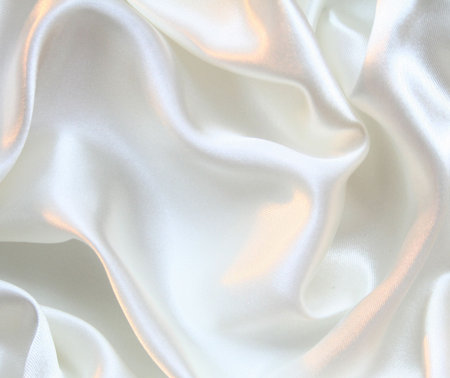 Smooth elegant white silk can use as backgroundの写真素材