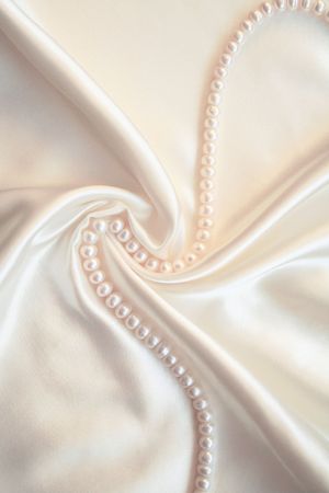 Smooth elegant white silk with pearls can use as wedding background の写真素材
